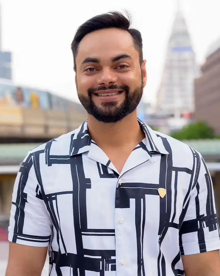 happy-young-bearded-indian-man-smiling